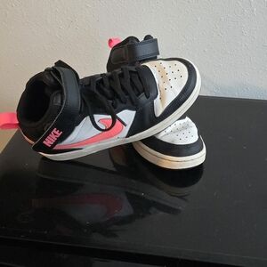 Nike Black and White High-Top Sneakers with Pink Accent